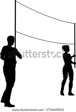 Two protestors or demonstrators at a demonstration march, picket line or strike protest rally in silhouette. Holding up a banner sign.