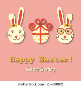 two rabbits and Easter egg wearing glasses with happy Easter sign.