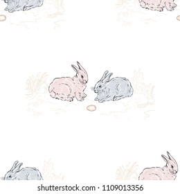 Two rabbits and golden egg seamless pattern