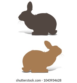 Two rabbits are sitting, silhouettes for decoration, on white background, vector