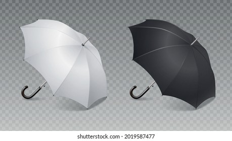 Two realistic umbrella icon set black and white umbrella canes on transparent background vector illustration