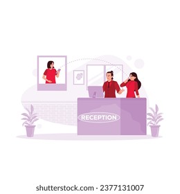 Two receptionists work at the counter, serving clients via telephone calls and data on computers. Hotel Receptionist Concept. Trend Modern vector flat illustration