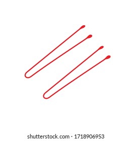 two red bobby pins on white background.