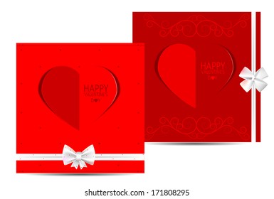 Two red cards with hearts and white bows dedicated to St. Valentine's day