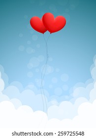 Two red heart-shaped balloons are flying in blue sky over white clouds