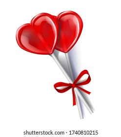 two red lollipops candy sweet isolated on white background. tied with a red ribbon on a bow. Layout for Valentine's Day