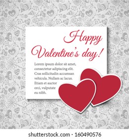 Two red paper hearts with white label on patterned background with hearts and flowers, Valentine day card