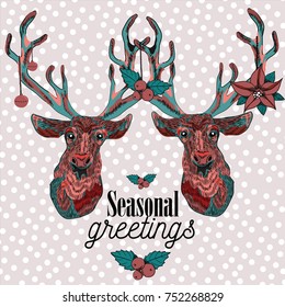 Two reindeers with christmas decoration on their antlers. Seasonal greeting with mistletoe. Vector illustration on light pink background with snowflakes.