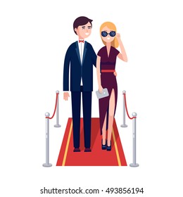 Two rich and beautiful celebrities man and woman walking on a red carpet. Modern colorful flat style vector illustration isolated on white background.