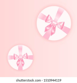 Two round gift wraps with voluminous pink bows. Idea for banners, cards, design promotions