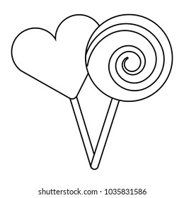 two round lollipop and heart shape candy