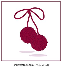 Two round pompons on a white background.