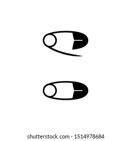Two safety pins open and closed.