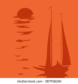 two sails in the sunset. sun in the sea.