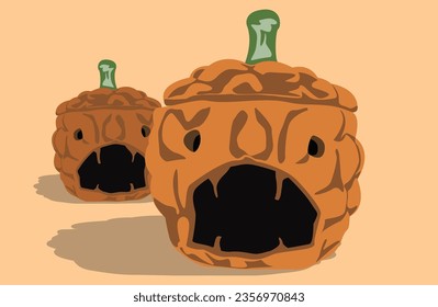 Two scary halloween pumpkins on orange background