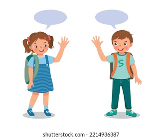 two schoolkids with backpack boy and girl say goodbye or hello waving hands to each others