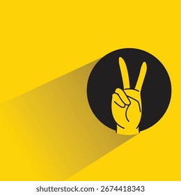 Botón del círculo del gesto de la mano de dos signos con la sombra sobre fondo amarillo