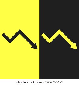 two signs down dark and yellow