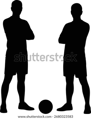 Two silhouetted athletes standing with arms crossed in front of a soccer ball