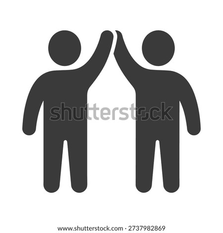 Two silhouetted figures giving each other a high five