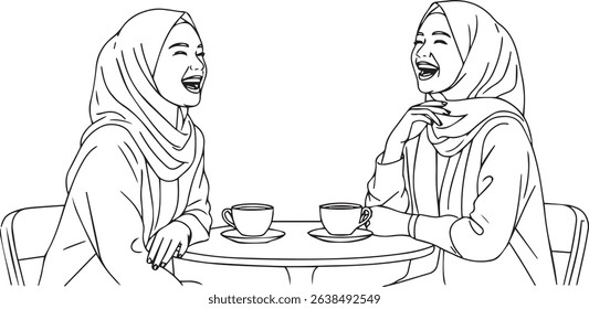
Two smiling women wearing hijabs are sitting at a table with cups, appearing to enjoy a conversation, friendship