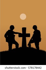 Two soldiers near the old grave with a cross.