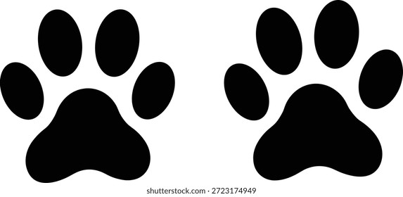 Dos huellas negras sólidas de la pata del perro se exhiben uno al lado del otro contra un fondo blanco crudo.
