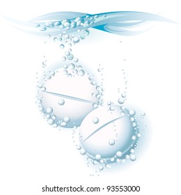 two soluble pills in water