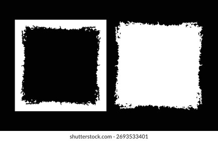 Two square frames with jagged torn edges one black and one white isolated on a black background