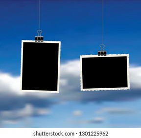 two square vector photo frames hanging on metal clips over clody sky. template photo design