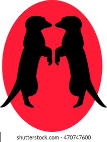 Two squirrels in love on a red sunset
