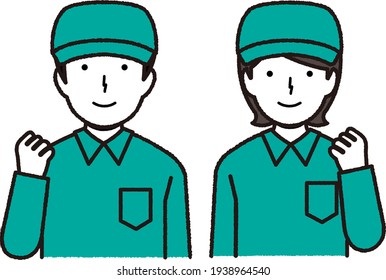 Two staff wearing work clothes