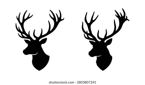 Two stag head silhouettes against a white background showcasing detailed antler formations silhouette deer buck male red cervidae