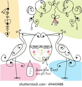 two storks and baby basket