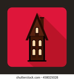 Two story cottage icon in flat style on a pink background