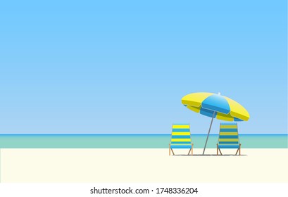 Two sun beds under a beach umbrella.
