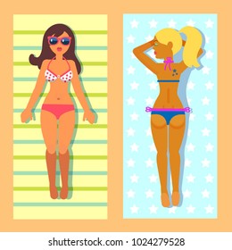 two sunbathing girls lying on the beach . Summer holidays