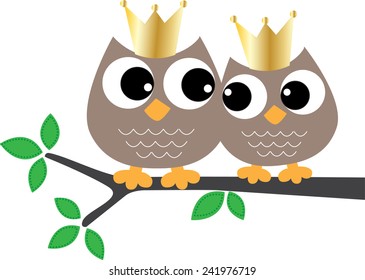 two sweet brown owls with golden crowns