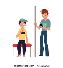 Two teenagers, boys sitting and standing in subway, using phone, smartphone, cartoon vector illustration isolated on white background. Full length portrait of two teenage boys using phones in subway