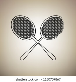 Two tennis racket sign. Vector. Brush drawed black icon at light brown background.