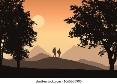 Two tourists with backpacks in mountain landscape with deciduous forest, under orange sky with sun - vector