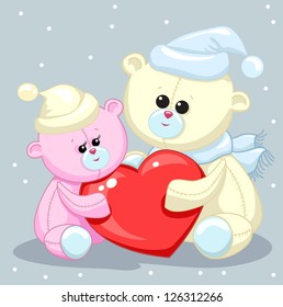 two toy teddy bear with a heart
