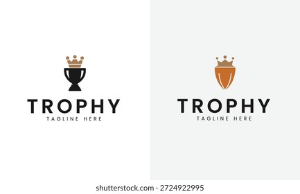 Dos trofeos con coronas y texto de la etiqueta del trofeo aquí negro oro marrón