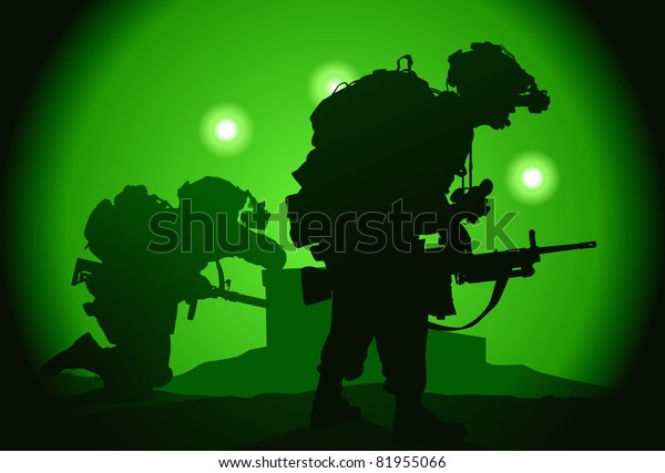 Two US soldiers\
used night vision goggles