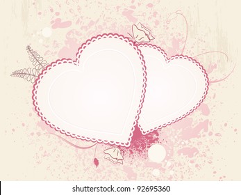 two valentine hearts on a grunge background with flowers and leaves