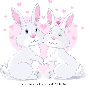 Two very cute white Bunnies in love