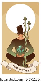 Two of wands. Tarot cards. Young man sitting, wearing hat looking at a globe.