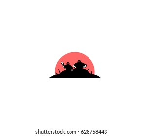 Two warriors with an ax and knives in the background of the sunrise