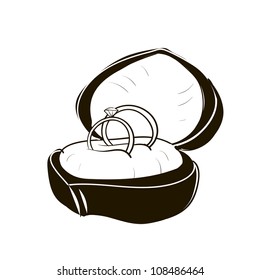 Two wedding rings in the box. A children's sketch