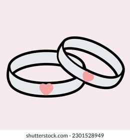 Two Wedding Rings on Pink Background 